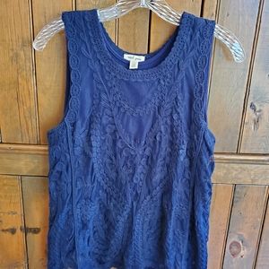Navy sleeveless top with lace overlay